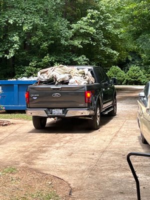 Truck load of junk removed from house. Also a dumpster of junk.