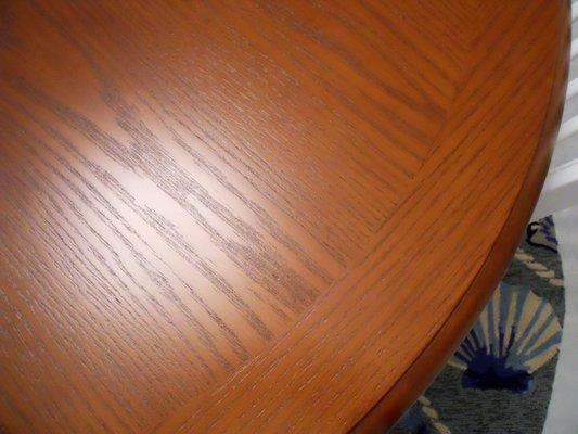 Refinished top of our dining room table. Beautiful color and grain.