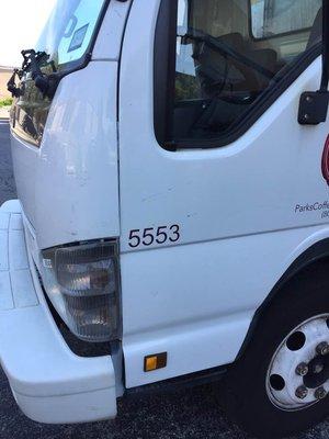 Here is a Parks Coffee delivery truck illegally parked in a handicap access zone at 3100 Timmons Ln, Houston.