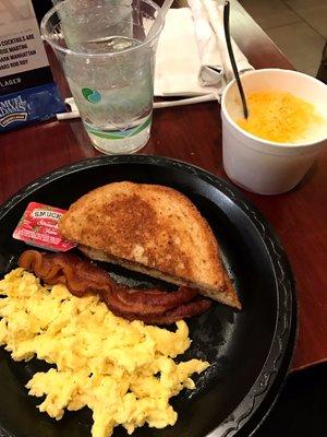 All American breakfast. 2 eggs, one meat, toast, Parmesan grits. Didn't taste any Parmesan but surprisingly not bad. $10