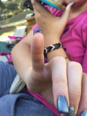 My friend got acrylic nails with a shellac manicure. Which was also half assed.