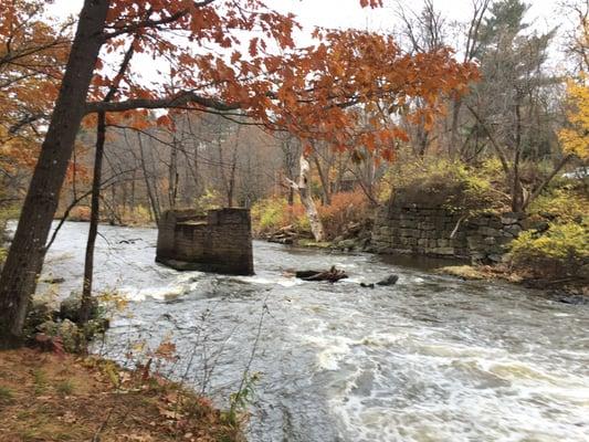 The stone supports are all that is left of the old bridge.