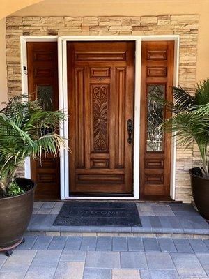 New stacked stone surrounding entry and pavers entry