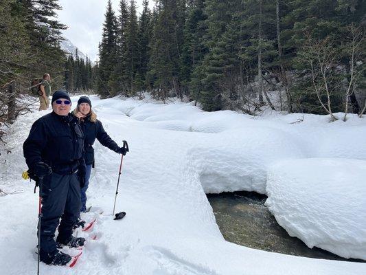 Snowshoeing by the creek while it snowed in the Alaskan Tongass Forest.