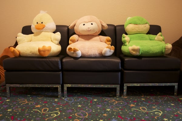 Our movie buddies in our private movie theater. Enjoy a movie on big screen TV while you wait!