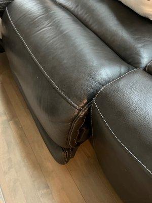 Armless leather recliner stuck in this position.