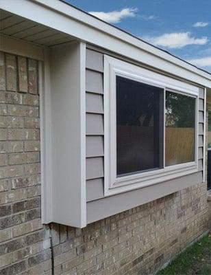 Bay windows crafted with vinyl siding will provide a lifetime's worth of low-maintenance for the homeowner.