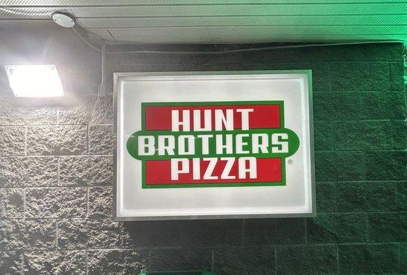 Hunt Brothers Pizza is located inside of the 4-way Quik Stop BP gas station in De Soto, IL.