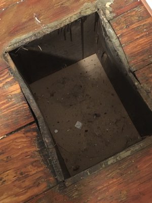 Floor vent, with register removed, leading nowhere