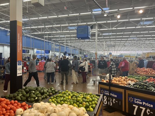 Line for self checkout going all the way to the back of the store