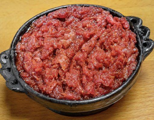 Kitfo
I can minced beef marinated in mitmita & spiced butter, traditionally served raw, but prepared to your liking