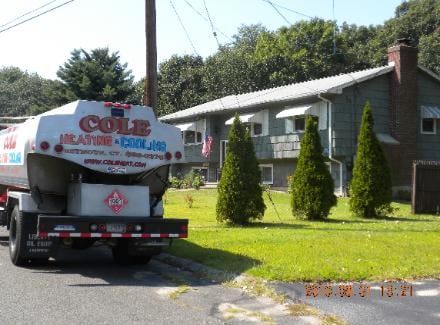 Our oil truck delivering oil to a valued customer