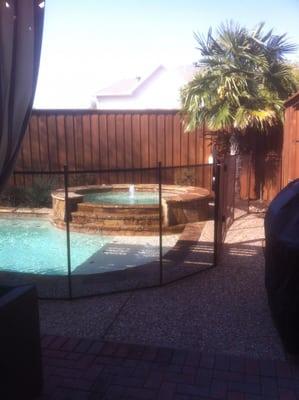 A desert bronze pool safety fence.