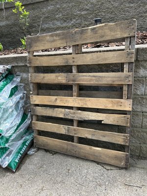 This pallet was left after I order 20 bags of mulch. After numerous phone calls they refuse to pick it up. I was told to put it in my car.