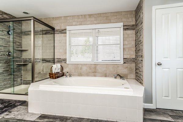 Updated Master Bathroom with Shower Stall and Soaking Tub .