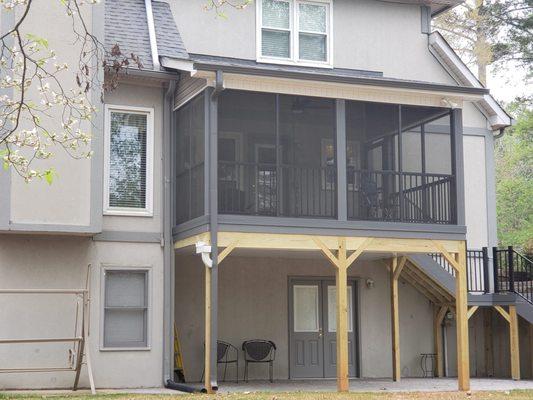 New deck with composite decking, fortress railing and beautiful screen