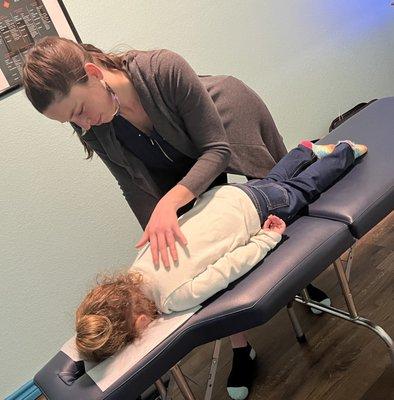 You are never too young for Dr Emily to release the tension in your spine.