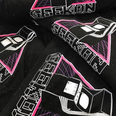 We've noticed that some of the best graphic design is three colors. This GeekON shirt is no exception. Great job guys.