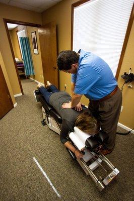 Dr. Ficklin adjusting a patient