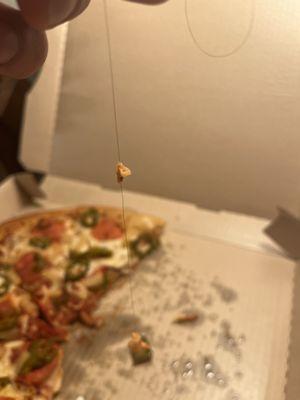 hair number two inside the same pizza slice..