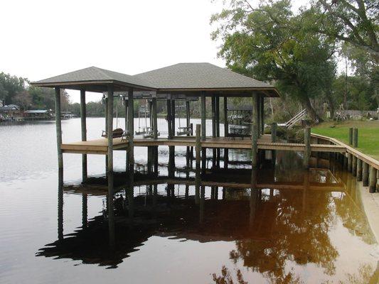 Double boathouse with covered platform.