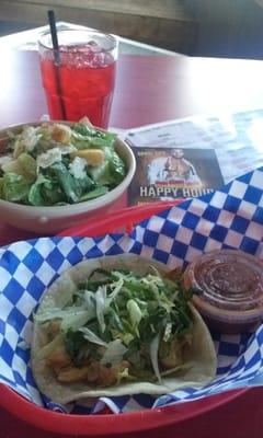 Stopping by for a snack - Caesar's salad & chicken taco.