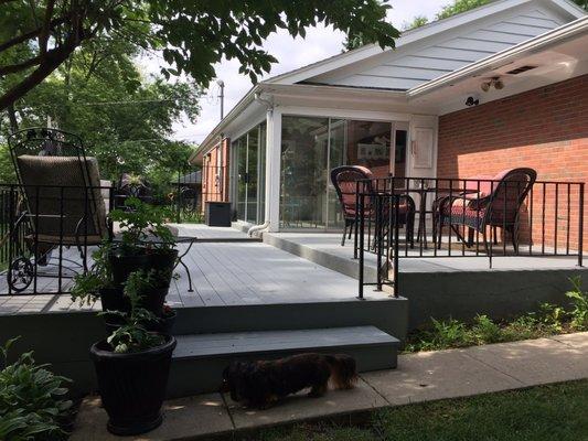 Beautiful deck.  Notice the dark strip at the step down.  Paul also suggested staining the concrete patio to match the deck.