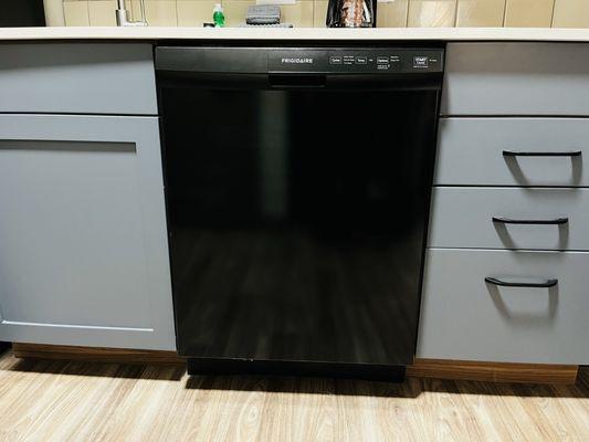 Dish washer. Drawers contain cookware and utensils.