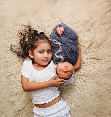 Newborn boy with big sister