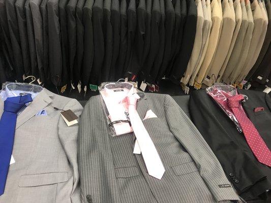 Sales person she matched everything suit with tie and hankies and shirt