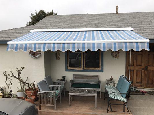 Love the color combination of this clients new retractable awning!