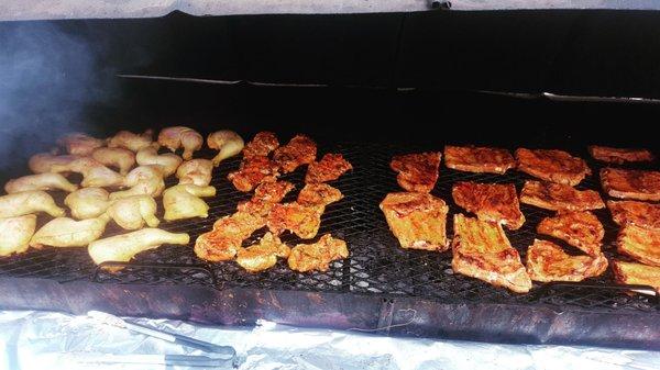 Pork ribs, chicken leg n thighs and skinless chicken grilling