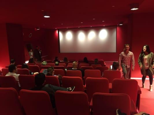 Inside red WME private screening room..