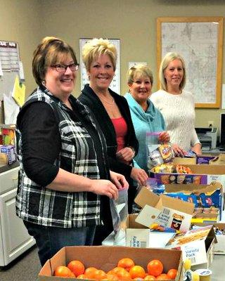 Thanks to our west side agents who gathered this morning to pack 100 lunches for 'warming souls sack lunches' - a program for the homeless.