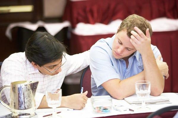 Students work together on a GMAT Data Sufficiency question