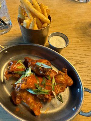 Buffalo wings with a side of fries and ranch