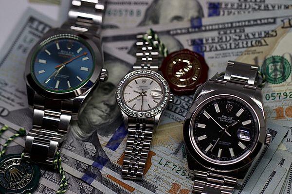 We buy high end watches! Rolex, Breitling, and more!