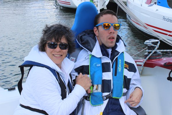 Mom and her son getting ready to sail with CRAB.