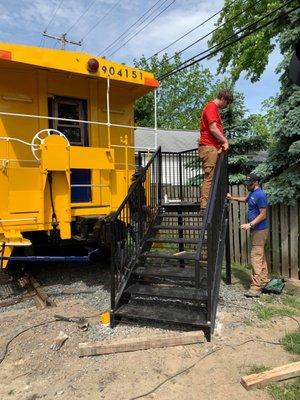 Installing stairs into the caboose