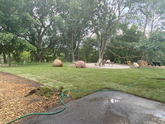 sod and large boulders