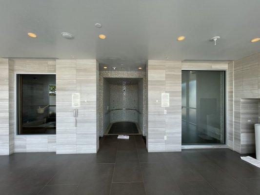 Left to right: Sauna, shower, and steam room.