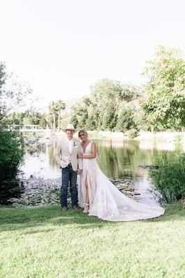 Gorgeous couple in front of the pond