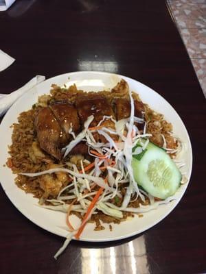 Fried chicken with shrimp fried rice.