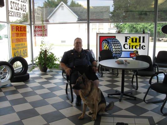 Ranger, my Hungarian Shepherd,  providing a customer companionship while his oil change is being done.