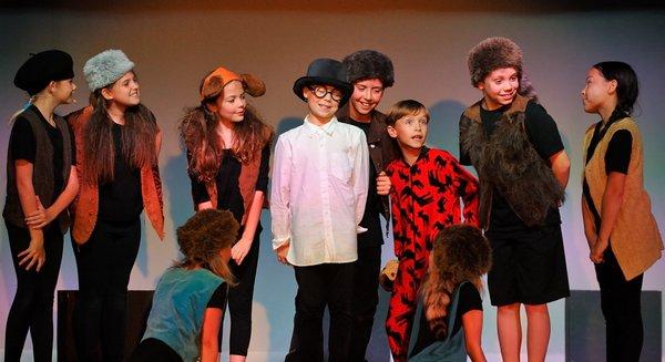 John and Michael Darling surrounded by the Lost Boys in Ovation's Fall 2016 performance of Peter Pan!