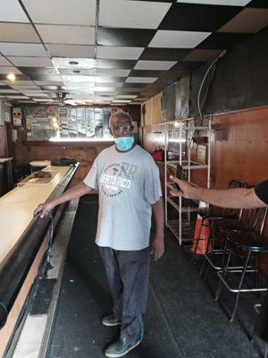 Last picture of one of the owners as we cleaned out the business.