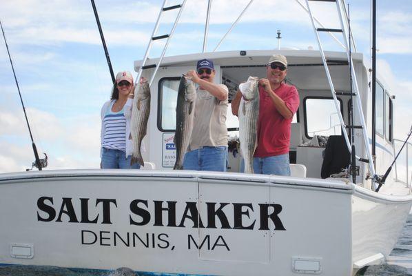 a day on the ocean catching striped bass