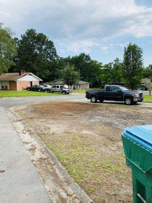 Front lawn.  Tree gone.  Debris cleared.