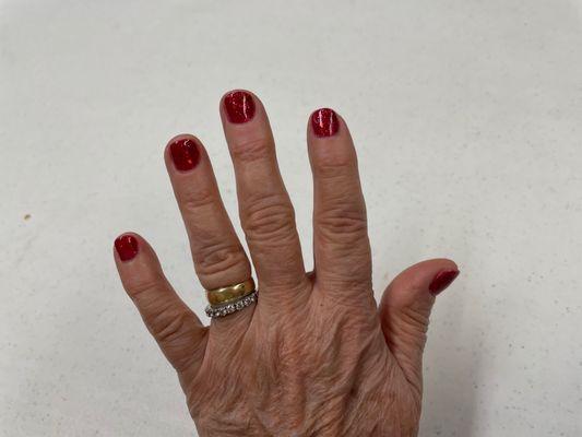 Glittery gel nails for the holidays on my 'getting older' pianists hands