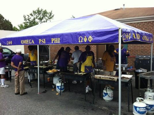 Lamda Omega Brothers setting owt the Pancake Extravaganza